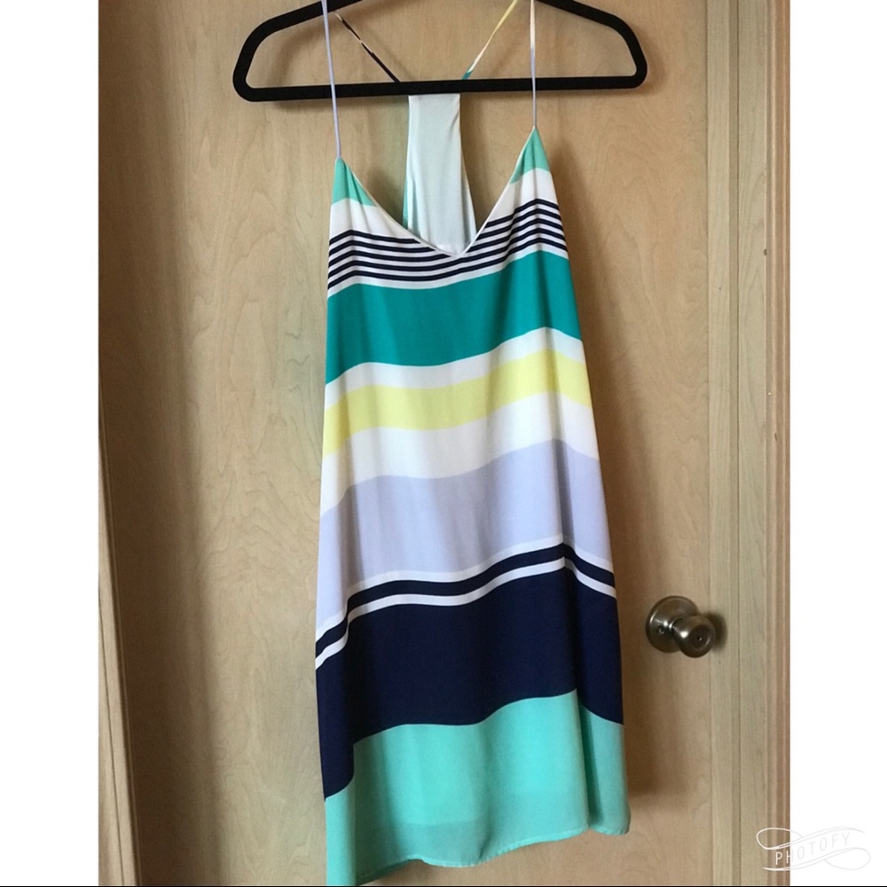 Short, spaghetti strapped dress.